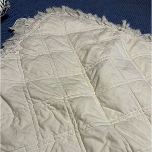 Threshold Brand 100 percent cotton white quilts and matching shams.